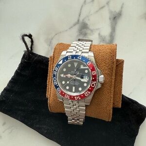 Rolex GMT-Master II with Silver Bracelet and Red-Blue Bezel